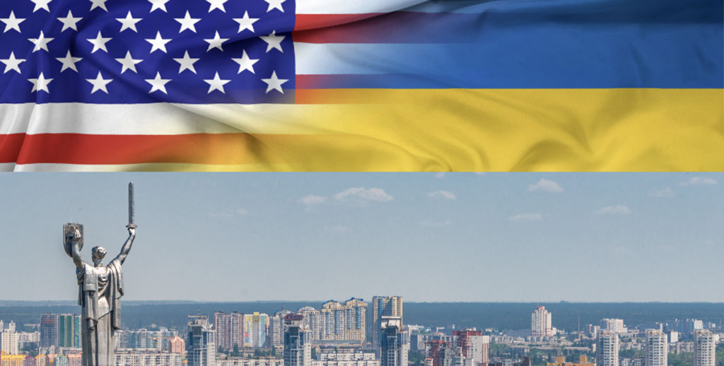 US Flag and Ukraine Flag above a photo of a Ukrainian city and waterfront