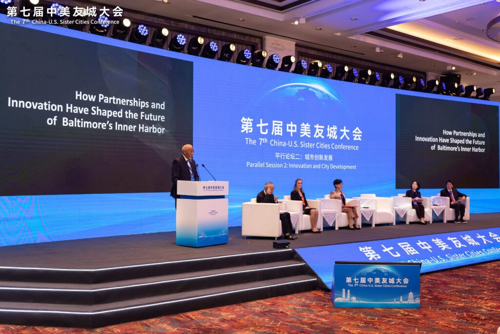 Hosea Chew gives a presentation about Baltimore at the conference at the 7th China-U.S. Sister Cities Conference, October 2025.